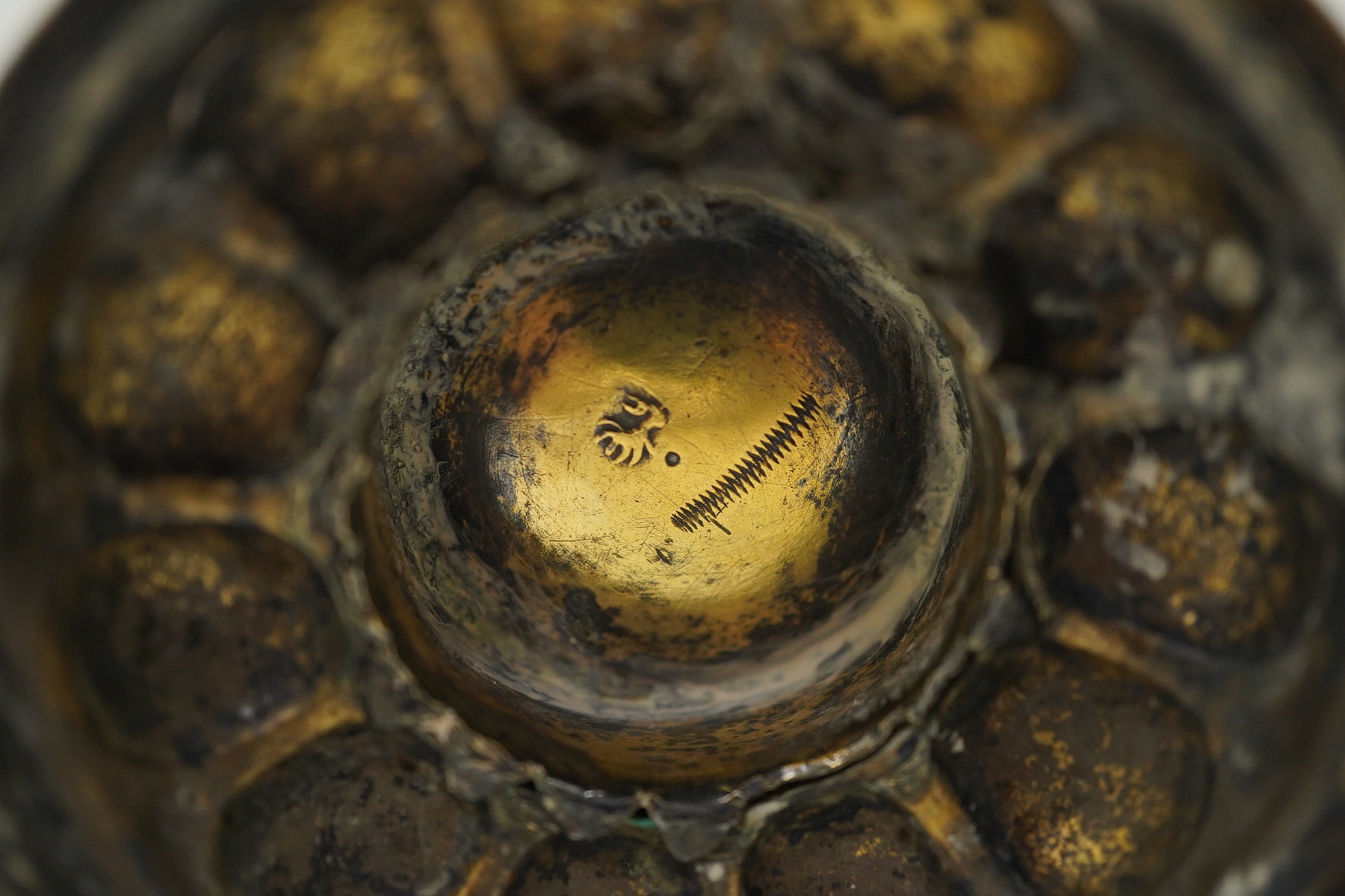 A 16th/17th century German silver gilt 'pineapple' cup and cover